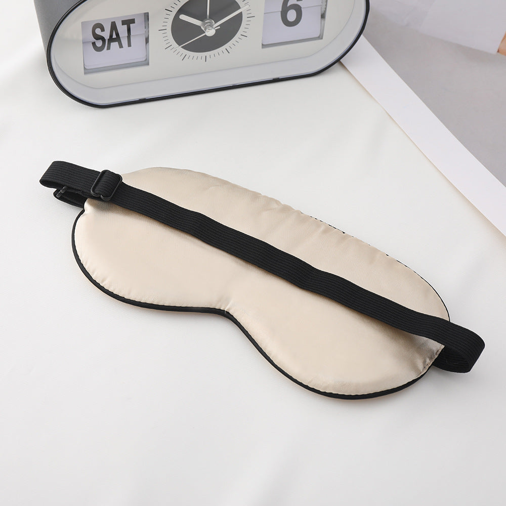Unisex embroidered contoured sleep mask with decorative text embroidery and adjustable elastic band Bowlift