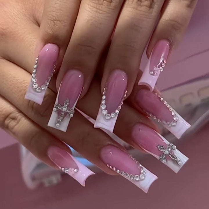 Acrylic nail set with glamorous rhinestone decorations and elegant French tips Bowlift
