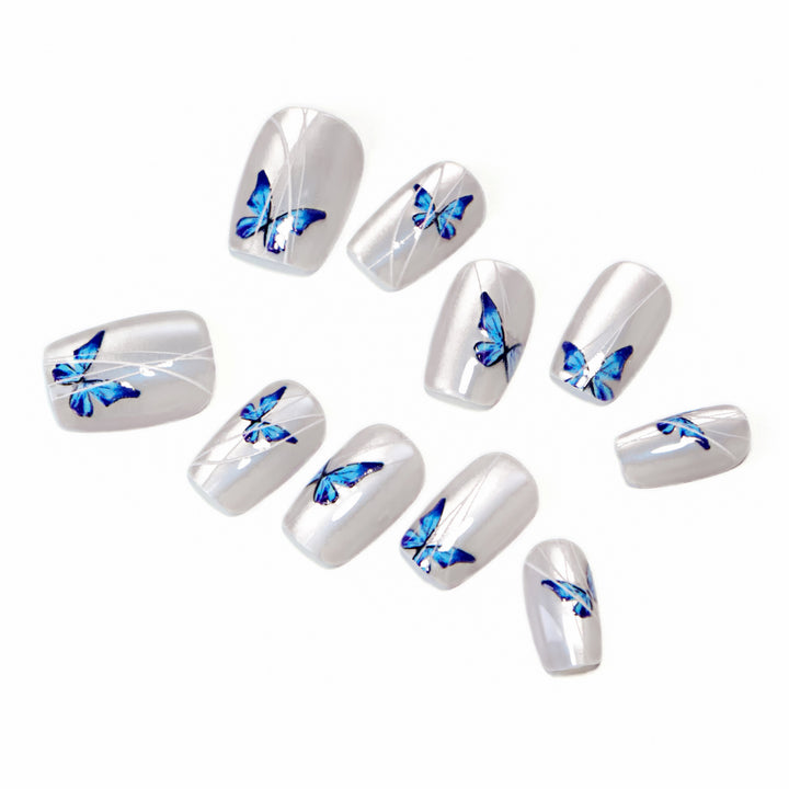 Creative nail extensions with intricate butterfly design Bowlift