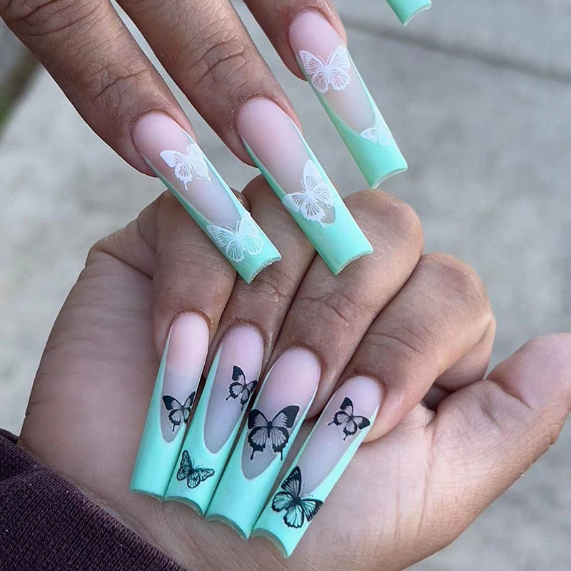 Artificial nail extensions with butterfly design Bowlift