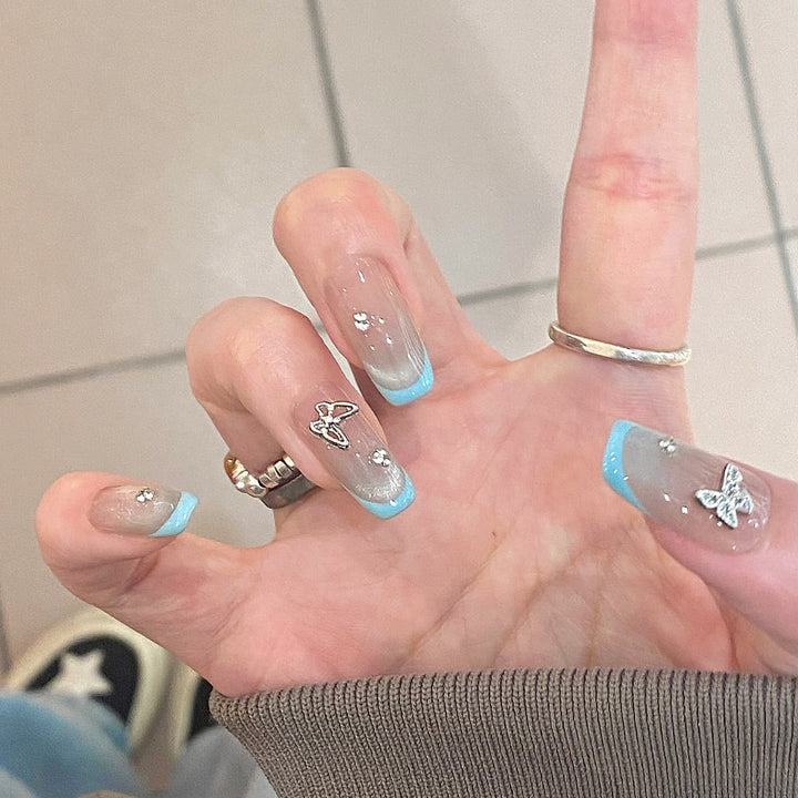 Artificial nail art with modern accents Bowlift