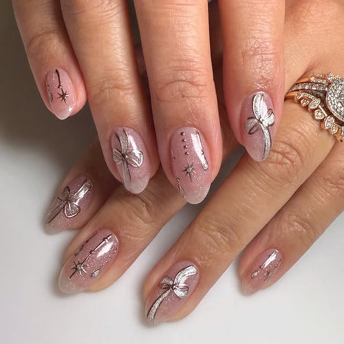 Artful glamour nail art with glossy accents Bowlift