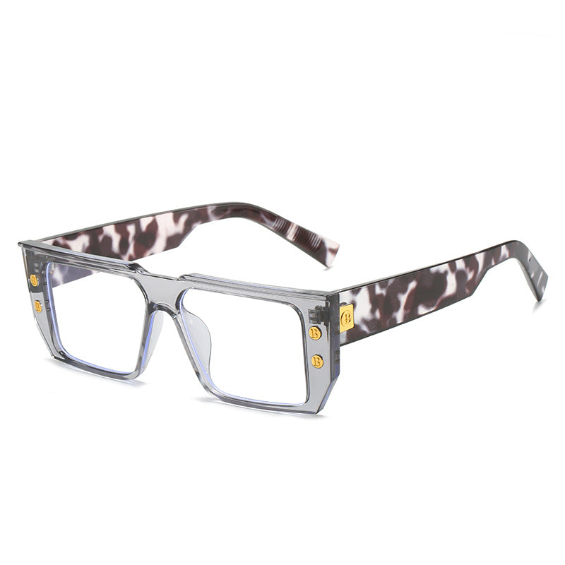 Women's fashionable clear glasses with golden accents Bowlift