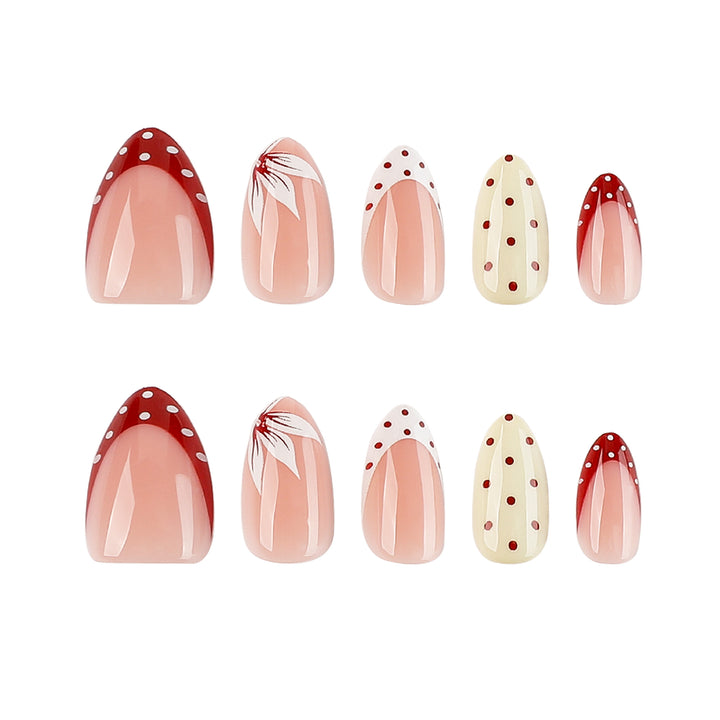 Artistic nail design with unique dots and floral embellishments Bowlift