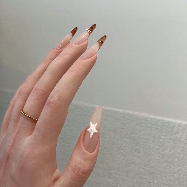 Elegant Long-Lasting Press-On Nails with Star Accents Bowlift