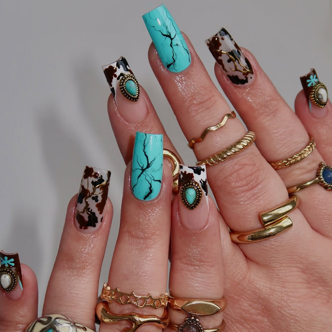 Artful fingernails with unique marble and jewelry design Bowlift