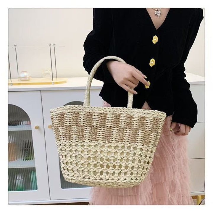 Handwoven basket bag with airy structure Bowlift