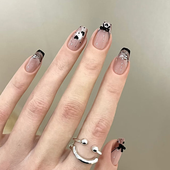 Elegant Artful Nail Design with Bow and Sparkle Accents Bowlift