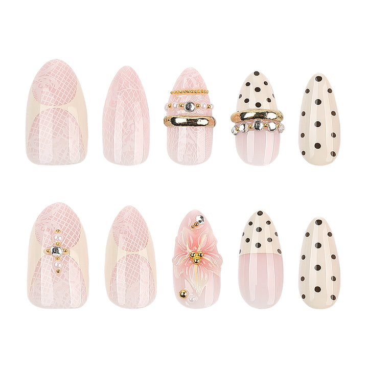 Artful Nail Extensions with Elegant Floral and Glitter Accents Bowlift