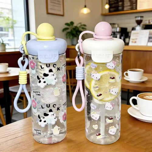 Women's water bottle with cheerful design and practical carrying handle Bowlift