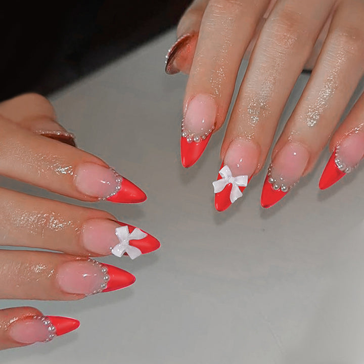 Elegant Press-On Nail Set with Pearl and Bow Accents Bowlift