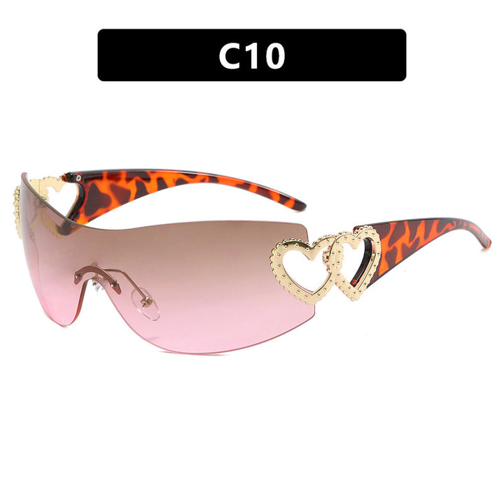 Ladies sporty sunglasses in trendy shield design with heart accents Bowlift