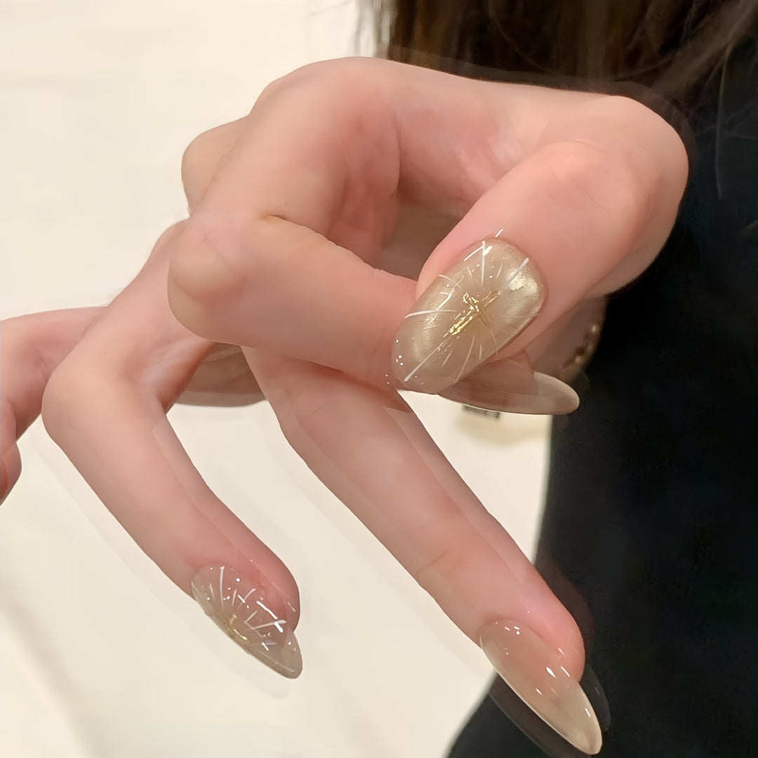 High-gloss artificial nails with filigree accents Bowlift