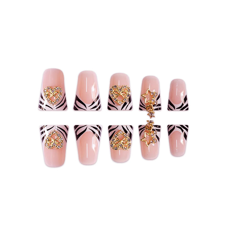Artistic Zebra-Patterned Nail Enhancements with Gem Accents Bowlift