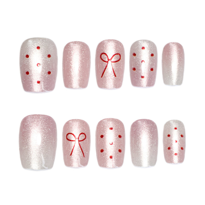 Artificial nail art with cute bow design Bowlift