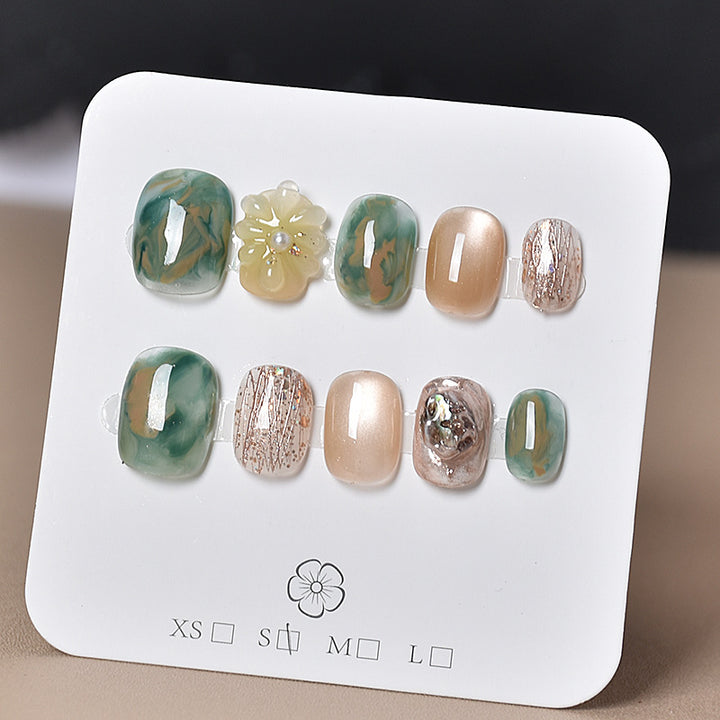 Elegant Nail Art Extensions with Pearl Accents Bowlift