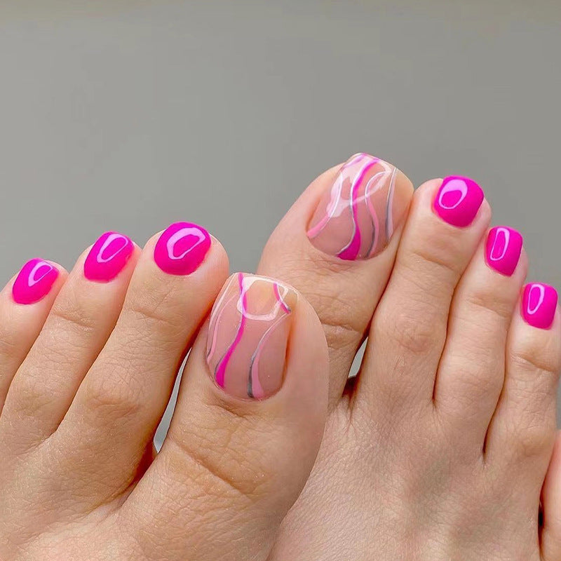 Artful toenail design with creative wave accents Bowlift