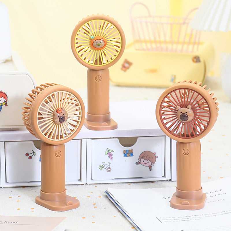 Unisex portable rechargeable hand fan with integrated stand and cute bear design Bowlift