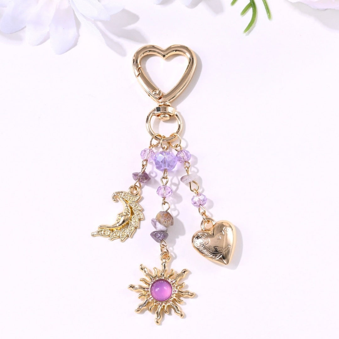 Keychain with Sparkling Sun Motif Bowlift