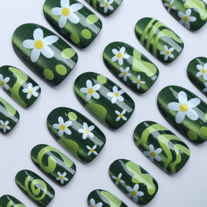 Artificial nails with floral and glittering accents Bowlift