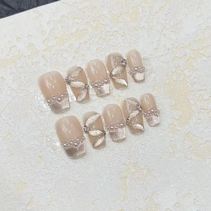 Luxurious Decorative Press-On Nail Set with Pearl and Gemstone Accents Bowlift