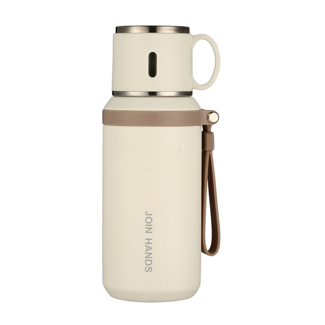 Women's insulated stainless steel drinking bottle with foldable cup Bowlift