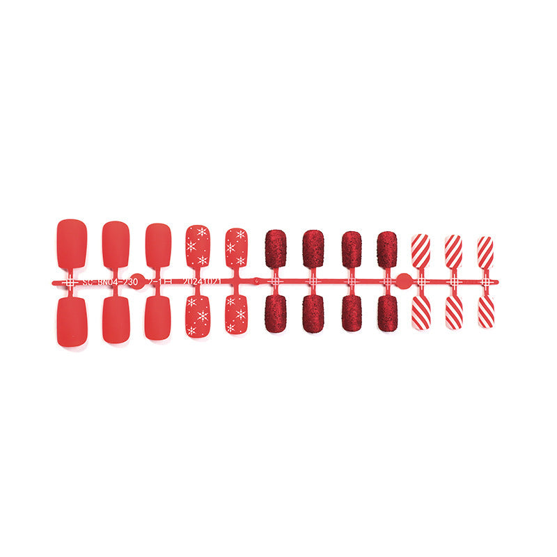 Artificial nail set in festive red with glitter and Christmas motifs Bowlift