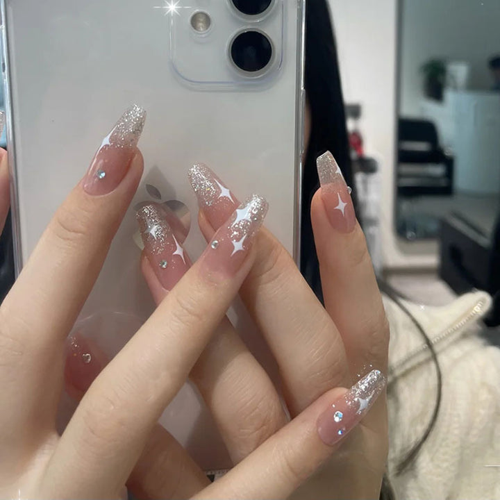 Artificial nail set with shimmering stones and sparkling glitter Bowlift