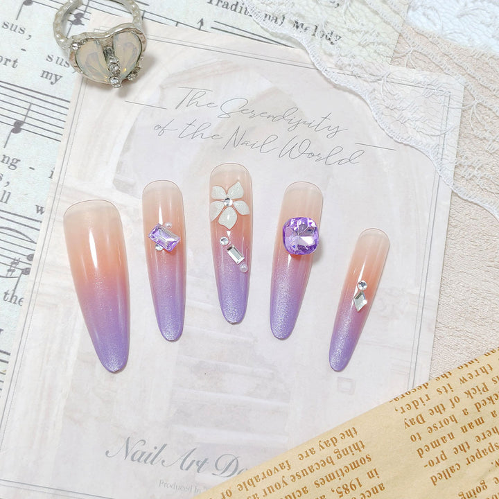 Artistic fingernails with delicate rhinestone details Bowlift