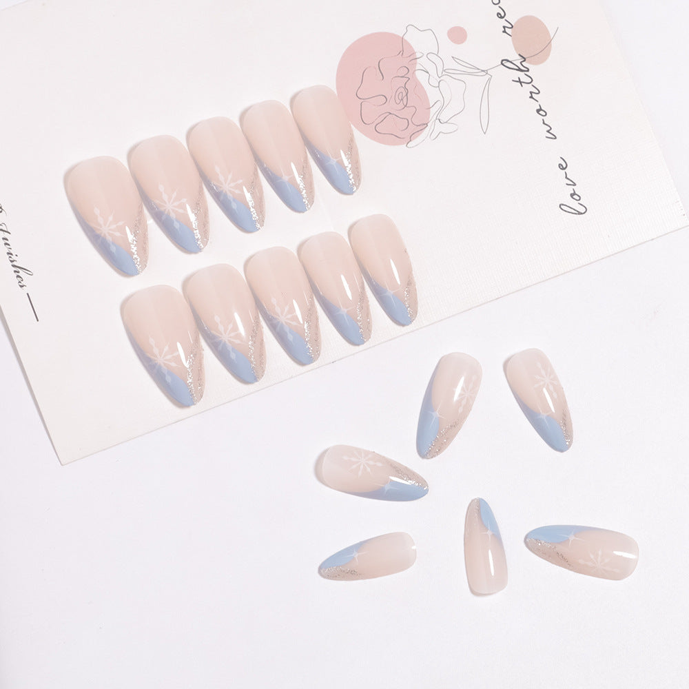 Artistic Press-On Nail Design with Elegant Floral Accents Bowlift