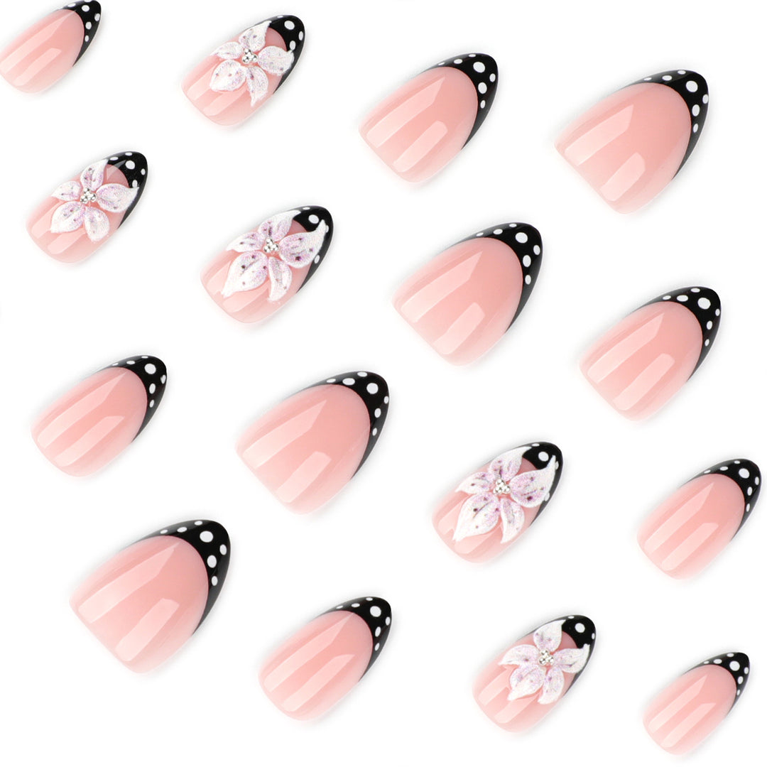 Artistic nail art with floral designs and elegant accents Bowlift