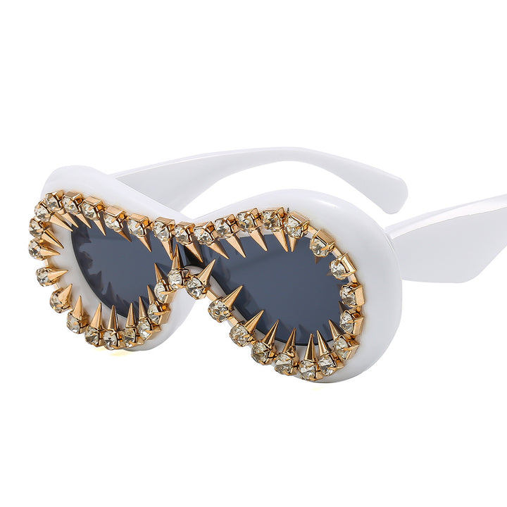 Women's fashionable sunglasses with extravagant spikes and crystal embellishments Bowlift