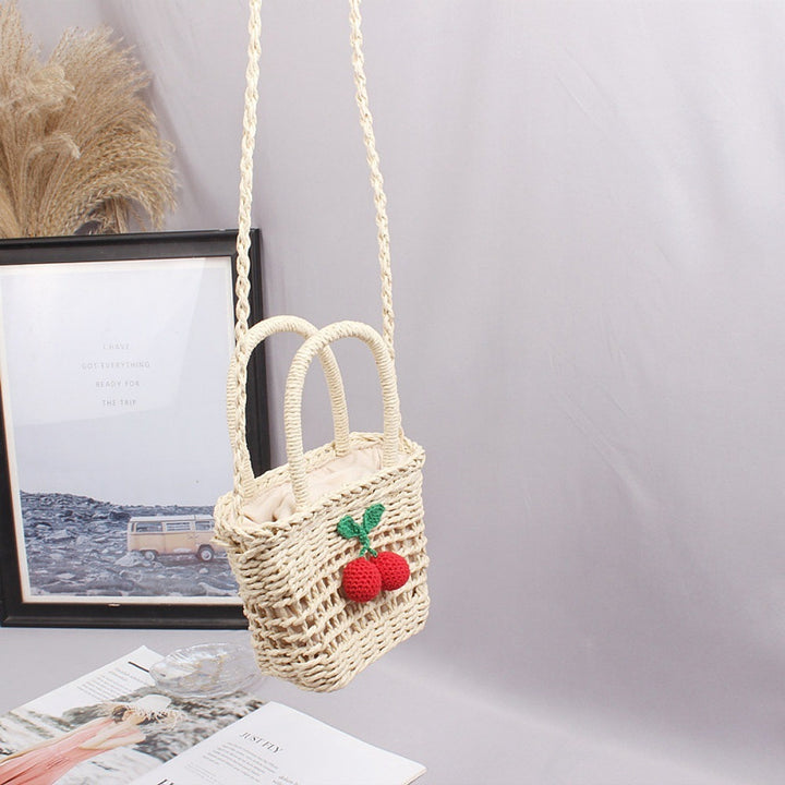 Basket bag with hand-knotted appliqués Bowlift