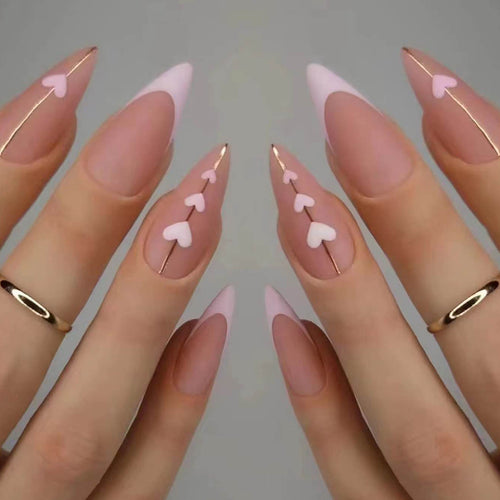 Artful stiletto nails with heart accents Bowlift