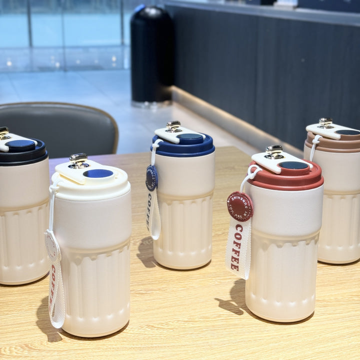 Ladies insulated cup with practical carrying strap Bowlift