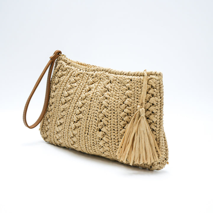 Woven natural material handbag with tassel Bowlift