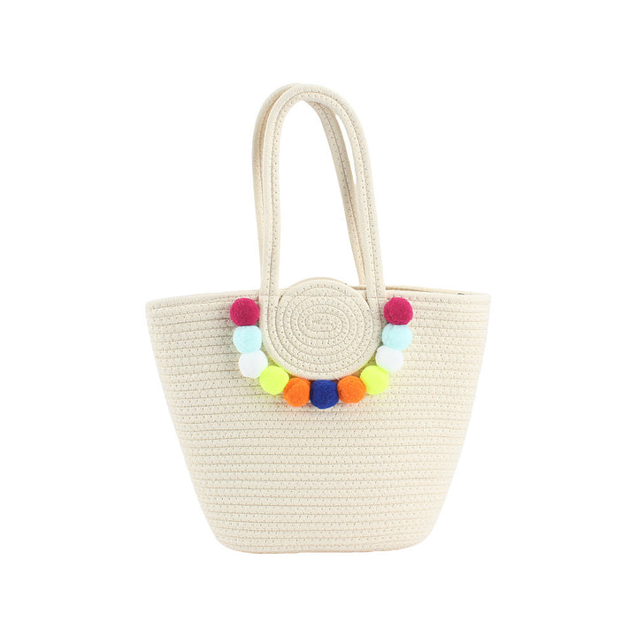 Beach bag with cheerful pom poms Bowlift