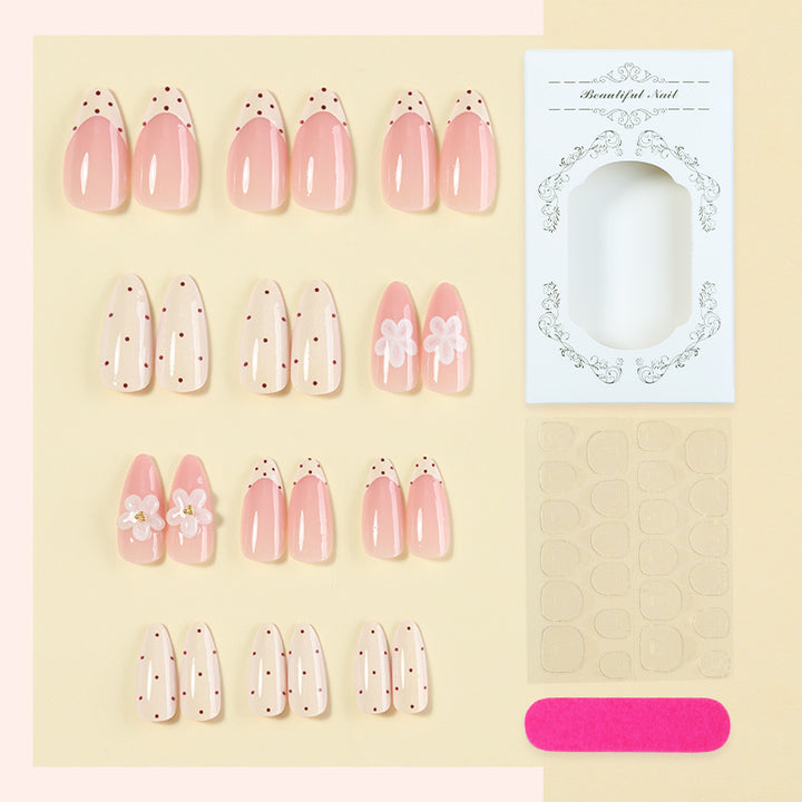 Elegant Press-On Nail Set with Floral and Polka Dot Designs Bowlift