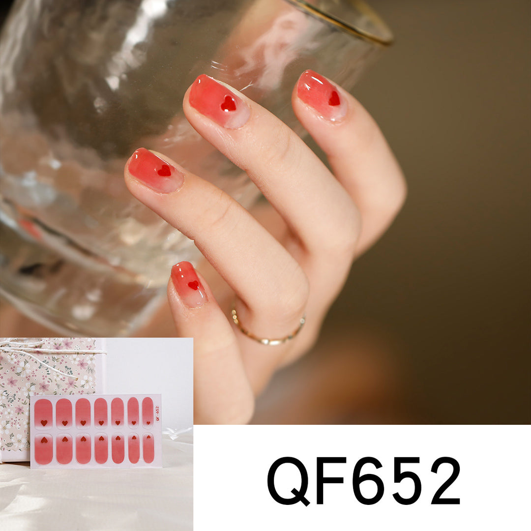 Artificial nail art with heart-shaped designs and soft color gradients Bowlift
