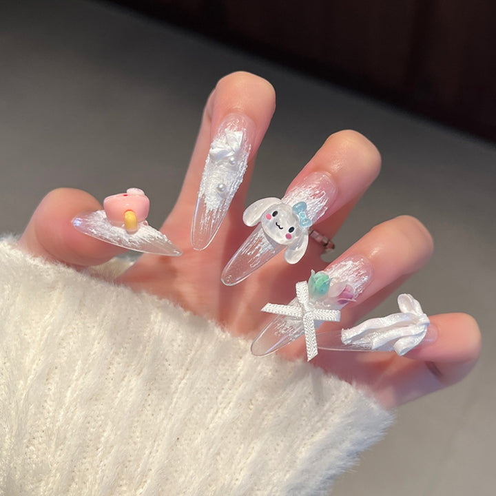 Artistic Stiletto Press-On Nail Art with Glimmering Accents Bowlift