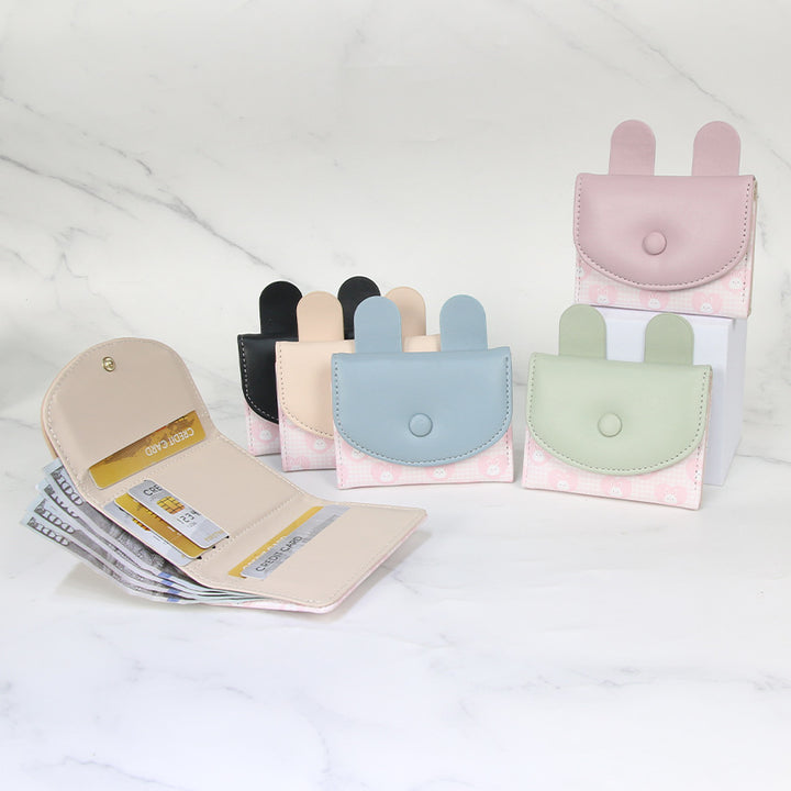 Compact rabbit-themed coin purse with snap closure and card slots Bowlift