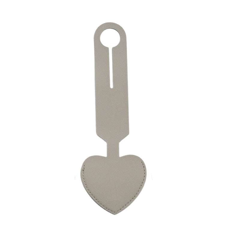 heart-shaped leather luggage tag with adjustable loop Bowlift