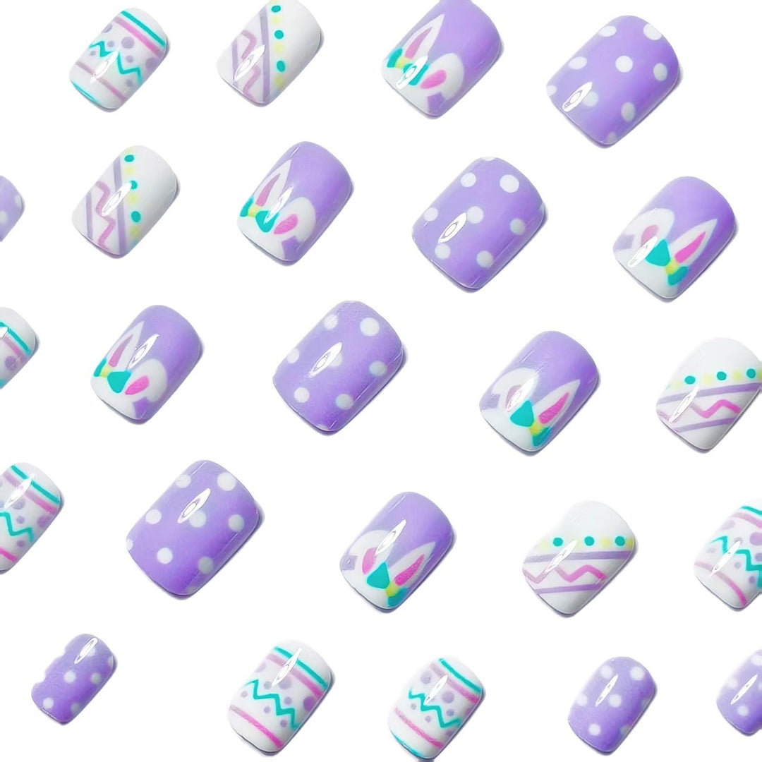 Artificial nails in creative Easter design Bowlift