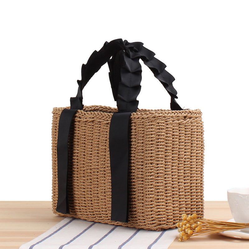 Playful basket bag with elegant fabric handle Bowlift