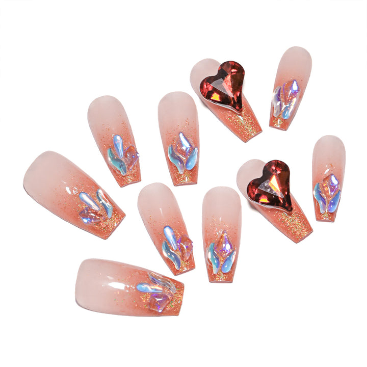 Artistic acrylic nails with heart design and sparkling accents Bowlift