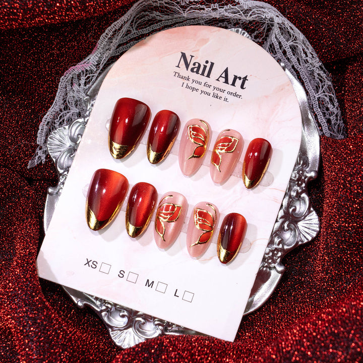 Artistic Press-On Nail Set with Floral and Metallic Accents Bowlift