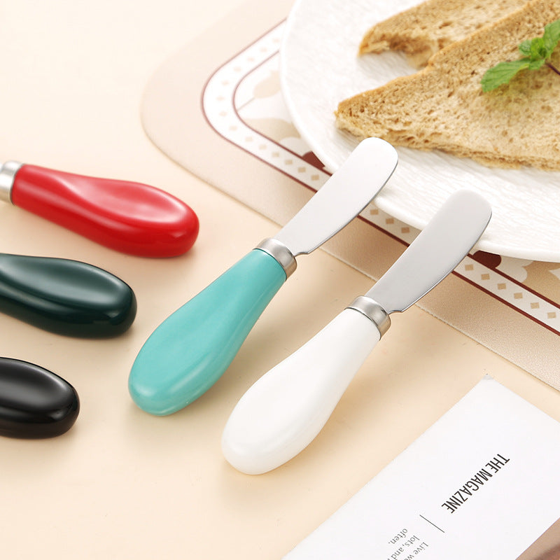 Elegant spreader knife with ergonomic handle Bowlift