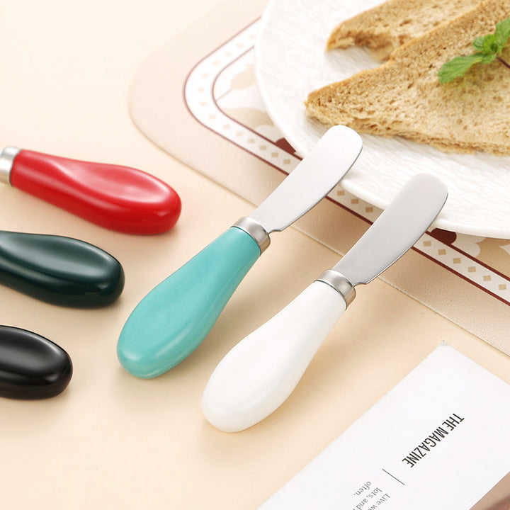 Elegant spreader knife with ergonomic handle Bowlift