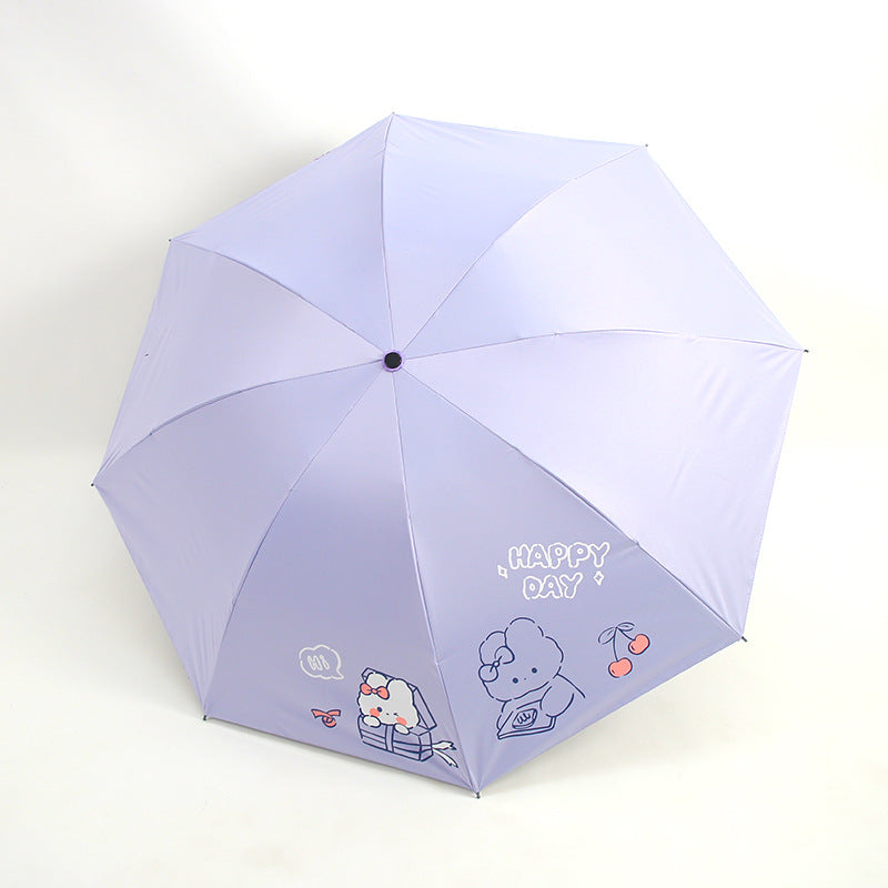 Ladies folding umbrella with playful design and cheerful Bowlift motif