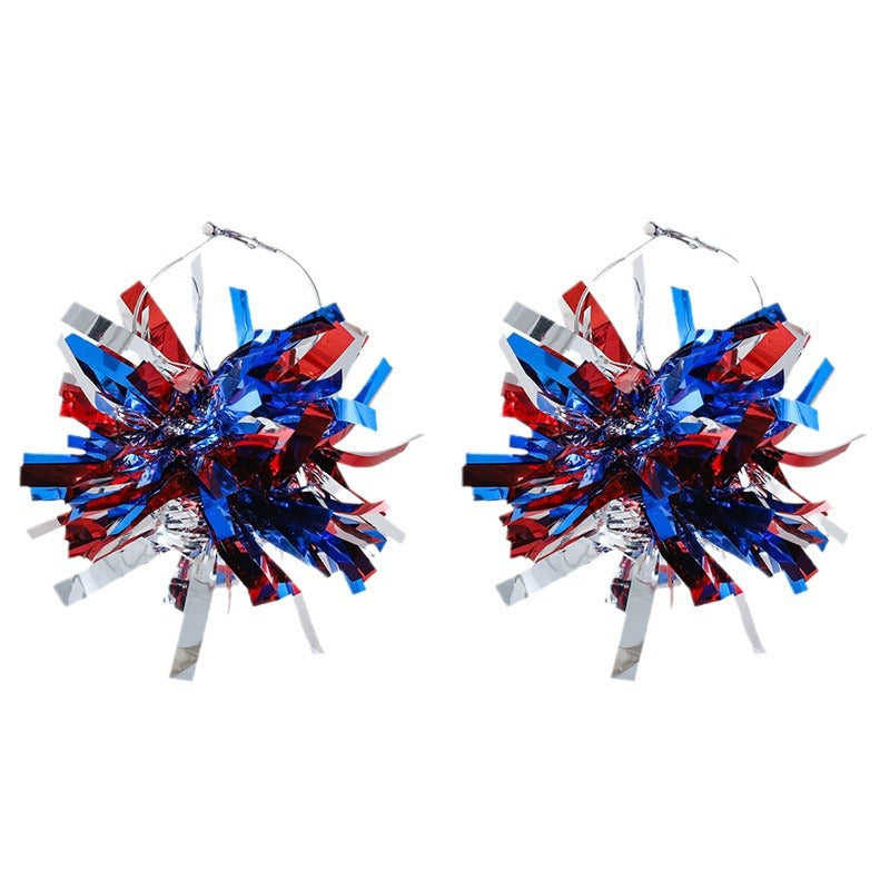 Women with eye-catching pompom hoops with lametta tassels and lightweight wire closure Bowlift